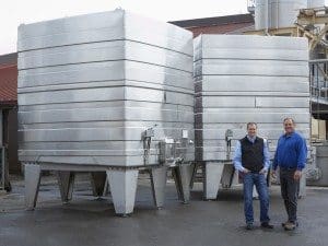 Winemakers Rick Sayre & Justin Seidenfeld (left) with tanks