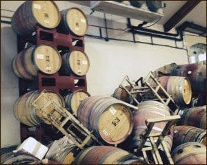 Barrels stacked on plastic racks in Napa cellar close to the epicenter of the August 2014 quake.