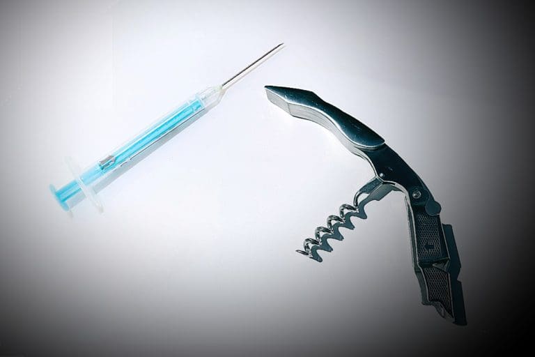 Needle and cork screw