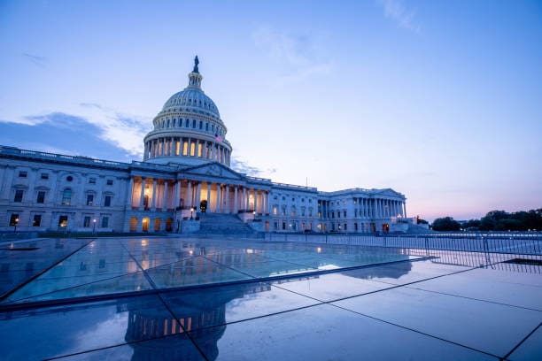 The US Capitol Building at dusk