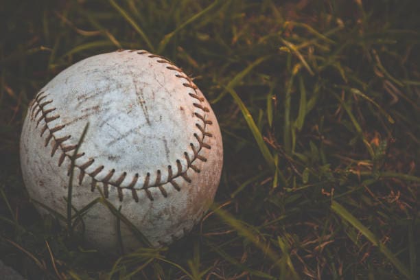 old baseball in field