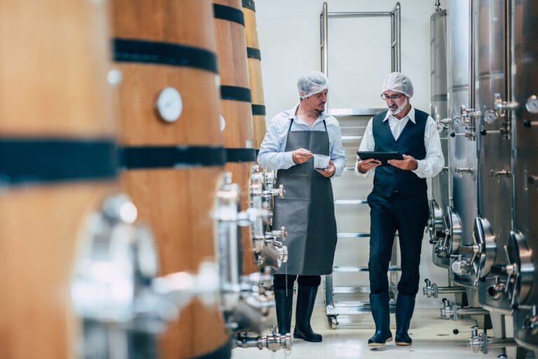 Winemaker,Working,In,Modern,Large,Winery,Factory,Liquor,Drink,Industry