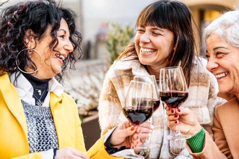 Genuine,Retired,People,Having,Fun,Toasting,And,Drinking,Red,Wine
