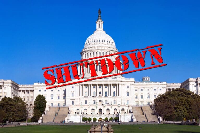 The,Us,Capitol,Building,With,Word,Shutdown,In,Rubber,Stamp