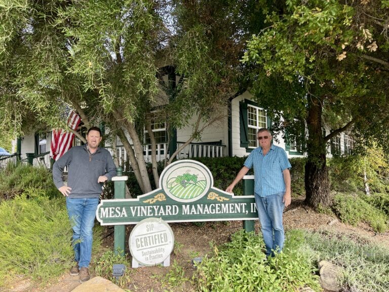 Mesa Matt and Dana w sip sign horizontal