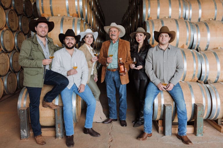 Bañuelos-family-with-Añejo-at-NOM-1588-(Hacienda-El-Mexicano)---horizontal