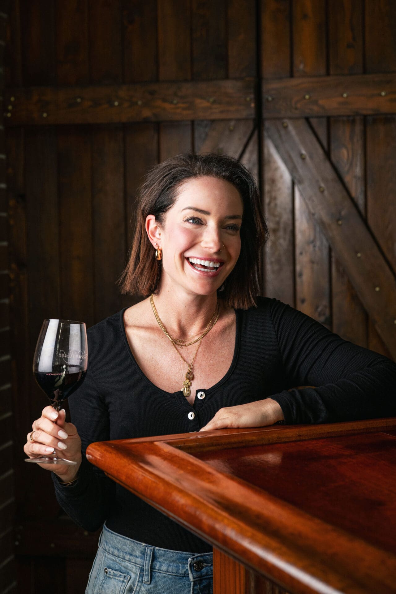 Chelsea Hinman Miller, owner of Tior Wines, celebrating top honors from the 2026 Sunset International Wine Competition.