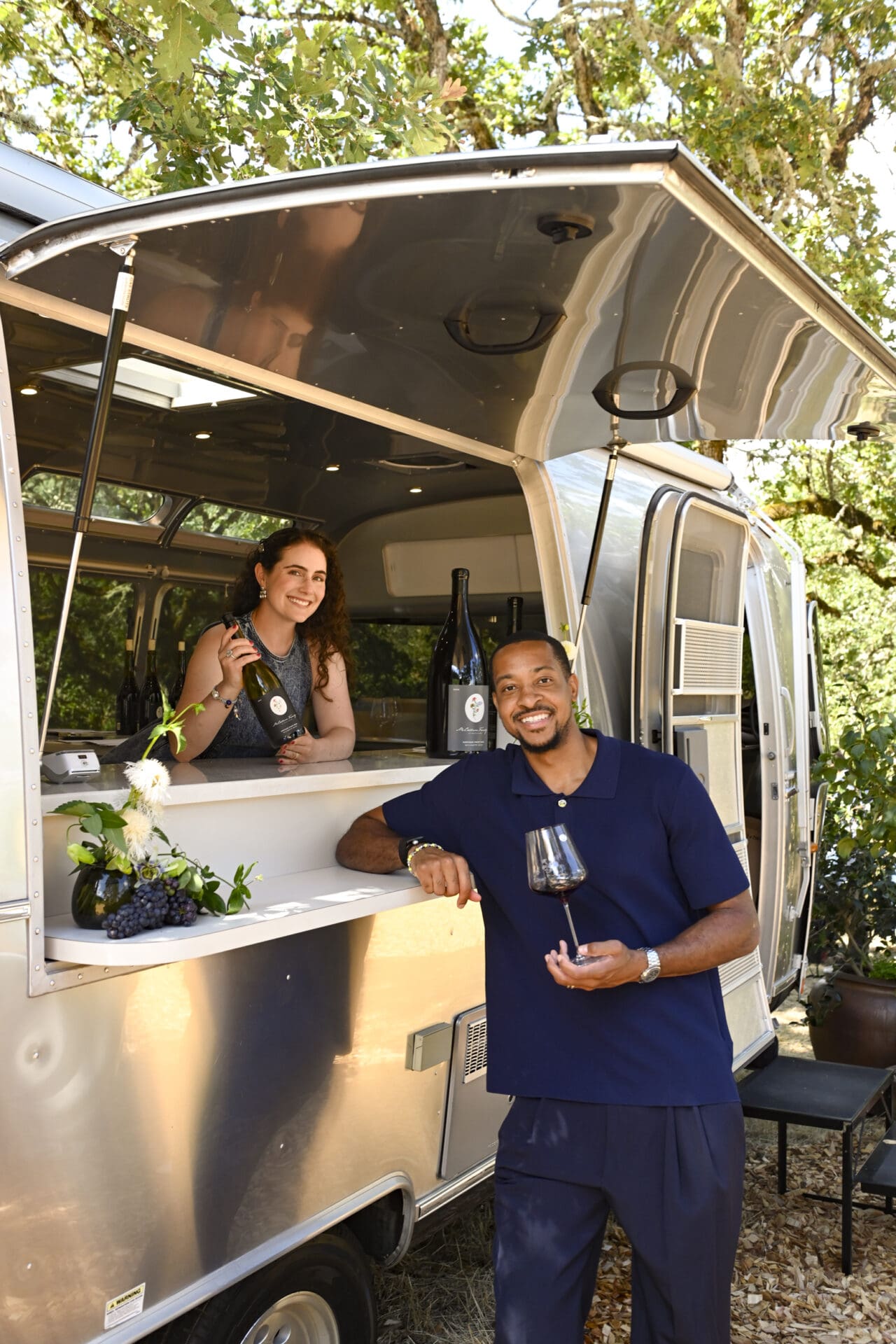 CJ and Elise McCollum with the vintage Airstream at their Carlton estate. Credit: Carolyn Wells-Kramer.